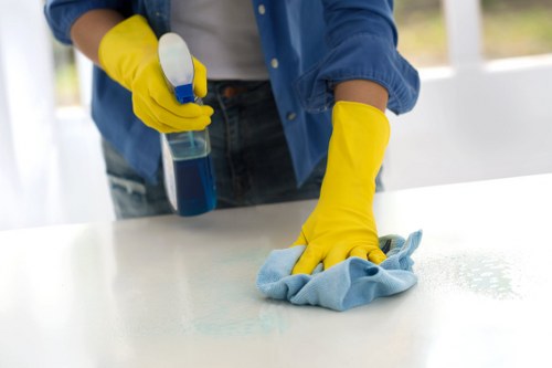Carpet cleaning team following safe working practices on site